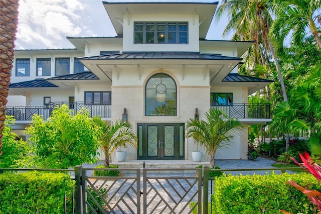 doorway to property featuring a balcony