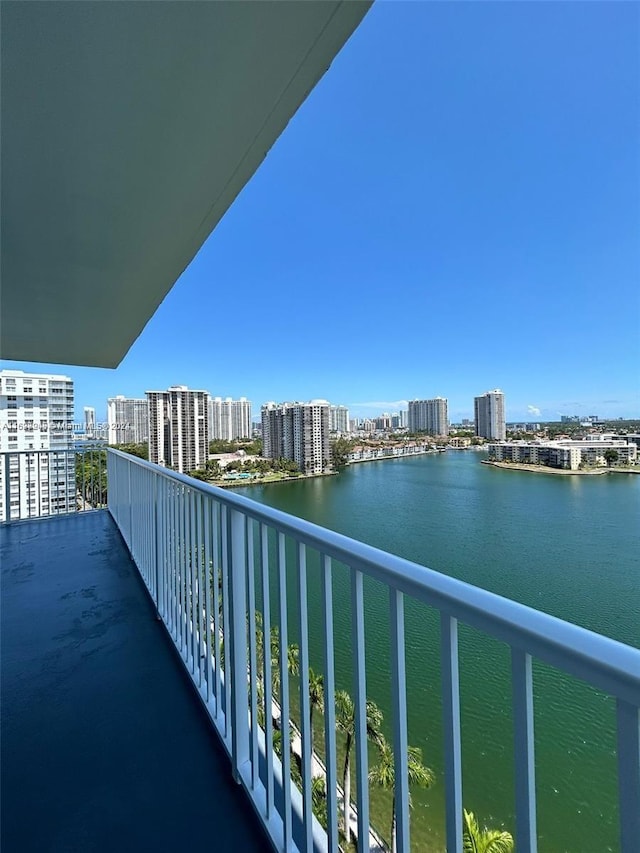 balcony featuring a water view