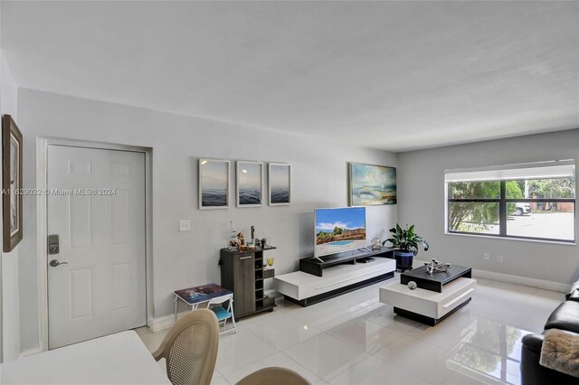 living room featuring light tile patterned floors