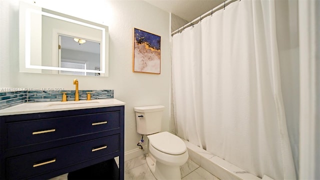 bathroom with tile patterned floors, vanity, and toilet