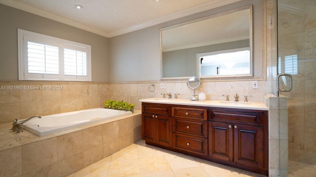 bathroom with independent shower and bath, ornamental molding, tile patterned flooring, and vanity