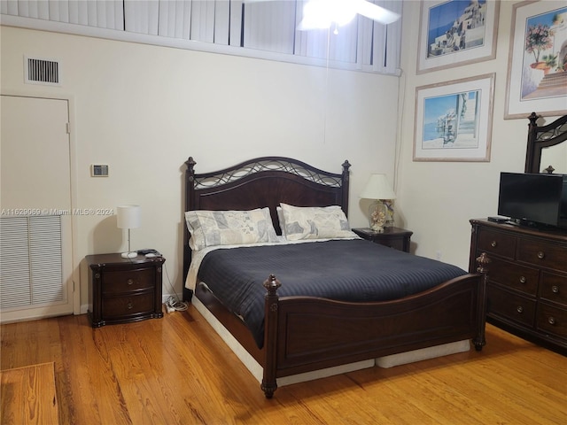 bedroom with light hardwood / wood-style flooring