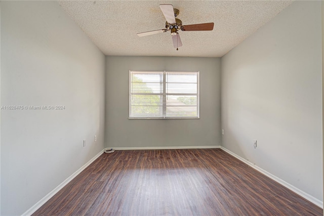 empty room featuring ceiling fan, a textured ceiling, and wood-type flooring