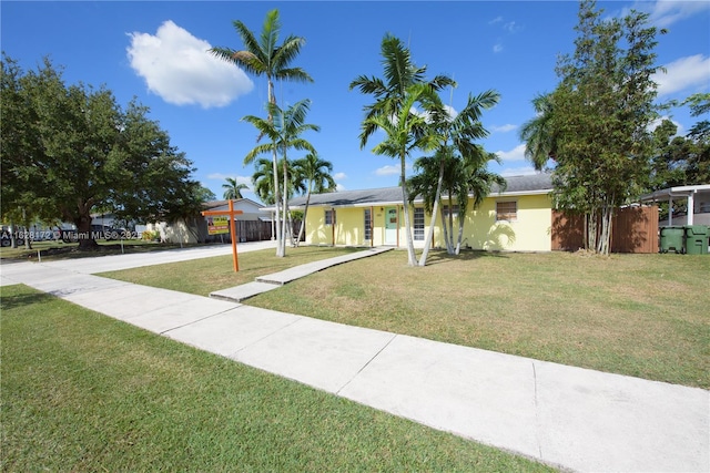 view of front of home with a front yard