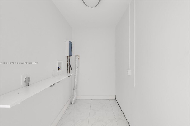 551 NW 42nd Ave, Coconut Creek, FL 33066 - hallway featuring baseboards and marble finish floor