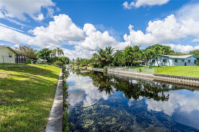 551 NW 42nd Ave, Coconut Creek, FL 33066 - property view of water featuring fence