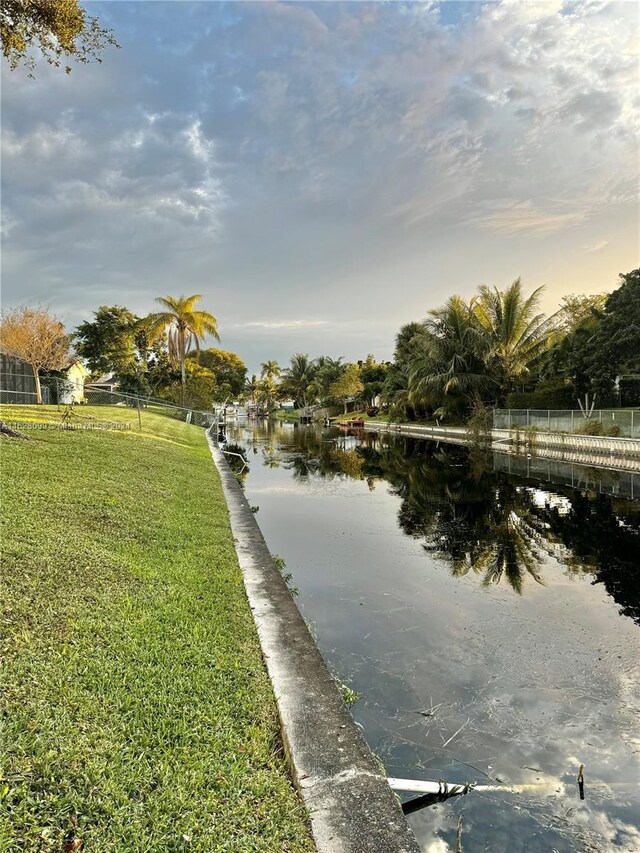 551 NW 42nd Ave, Coconut Creek, FL 33066 - property view of water featuring a boat dock