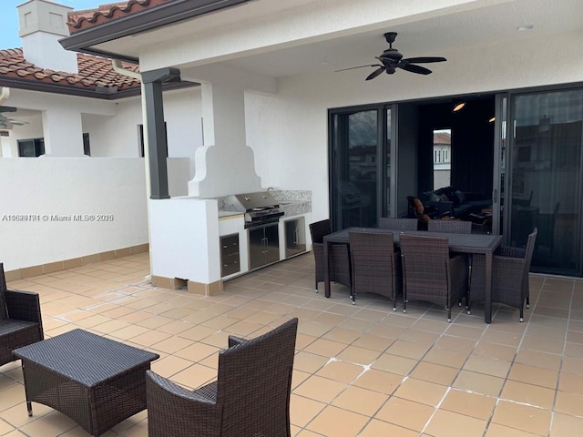 view of patio / terrace featuring ceiling fan and a grill