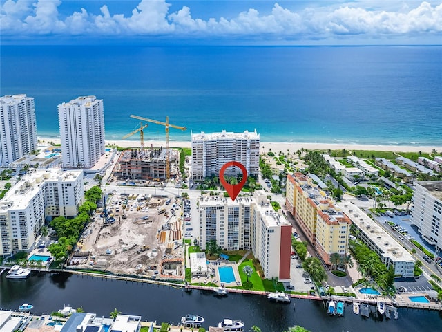 birds eye view of property featuring a water view