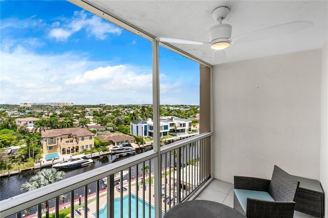 balcony featuring a water view