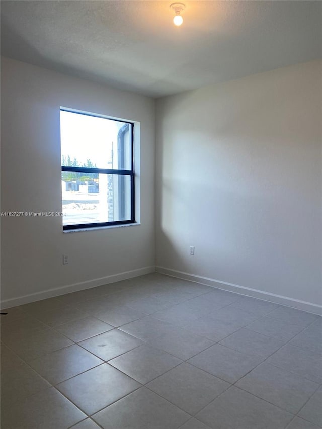 view of tiled empty room