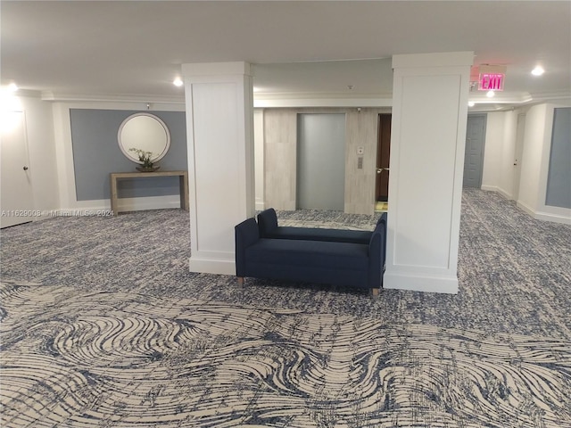 interior space featuring carpet floors and crown molding