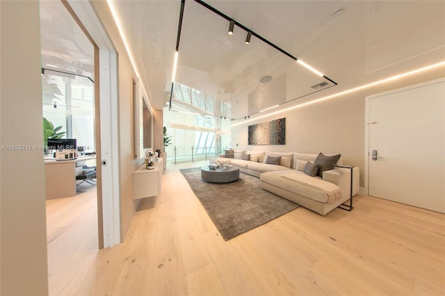 living room with light hardwood / wood-style floors