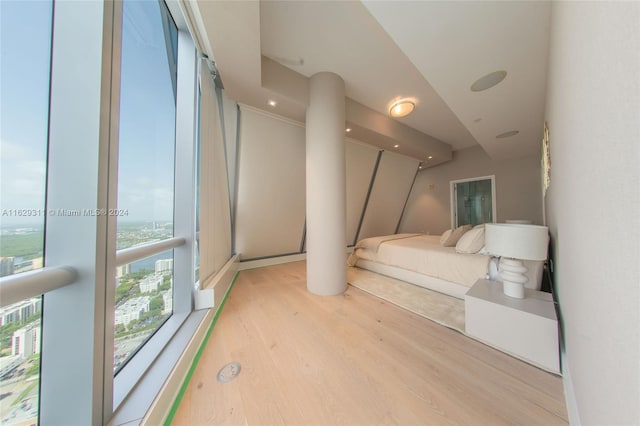 bedroom with light wood-type flooring