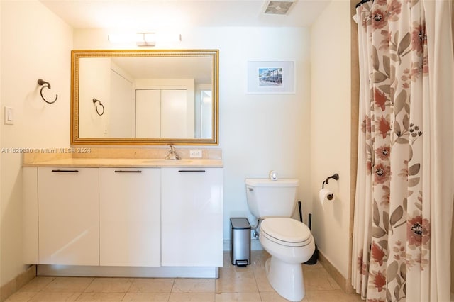 bathroom with vanity, toilet, tile patterned flooring, and a shower with shower curtain