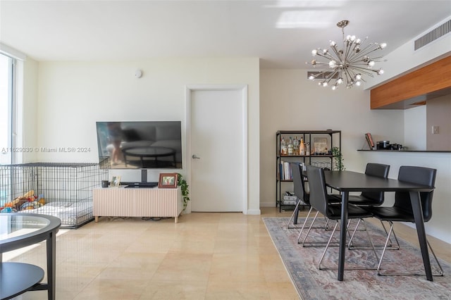 dining area with a notable chandelier