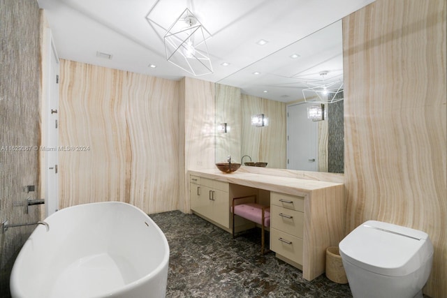 bathroom featuring a bath, tile patterned flooring, toilet, and vanity