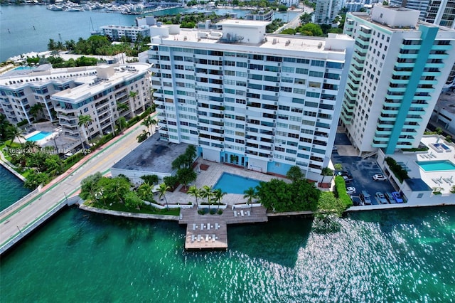 birds eye view of property featuring a water view