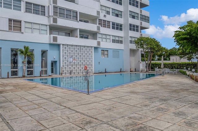 view of pool featuring a patio