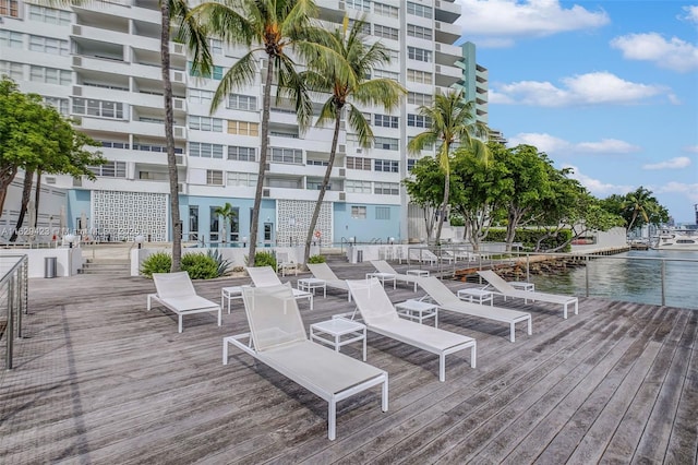 wooden deck with a water view