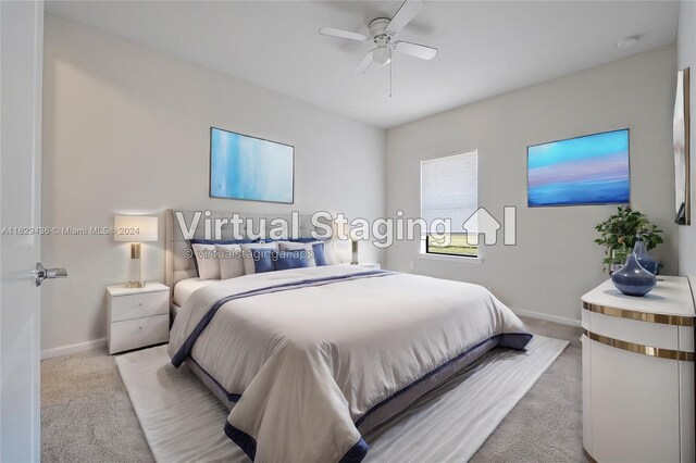 bedroom featuring light carpet and ceiling fan