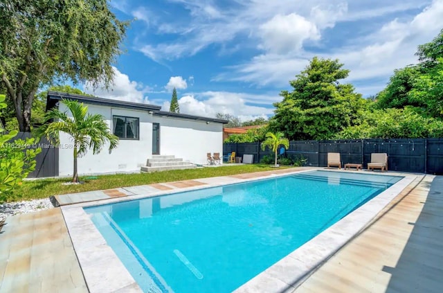 view of pool featuring a patio area