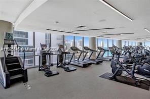 exercise room with a wall of windows