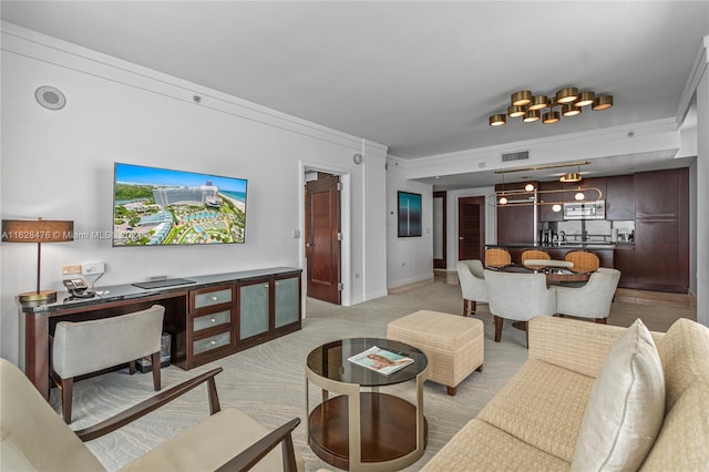 living room with light carpet and ornamental molding