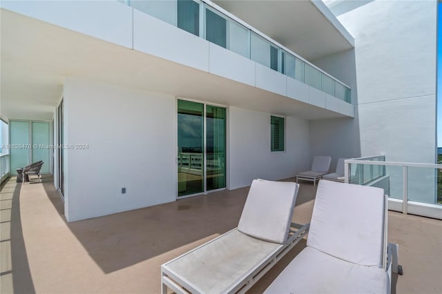 view of patio / terrace with a balcony