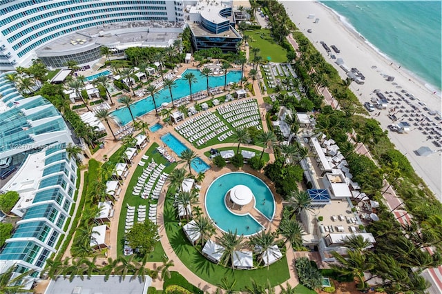 bird's eye view with a water view and a view of the beach