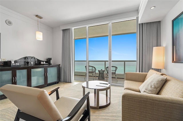 living room featuring a water view