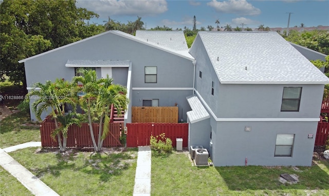 22 Crossings Cir Unit E, Boynton Beach, FL 33435 - view of front of property featuring stucco siding and a shingled roof
