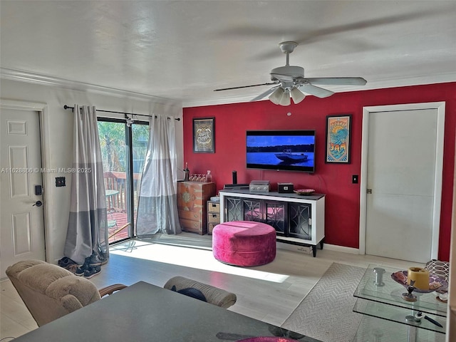 22 Crossings Cir Unit E, Boynton Beach, FL 33435 - living room featuring wood finished floors, a ceiling fan, and ornamental molding