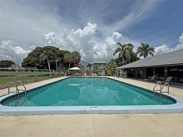22 Crossings Cir Unit E, Boynton Beach, FL 33435 - community pool with a patio area