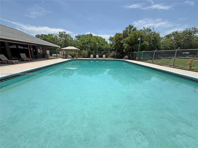 22 Crossings Cir Unit E, Boynton Beach, FL 33435 - community pool with view of wooded area