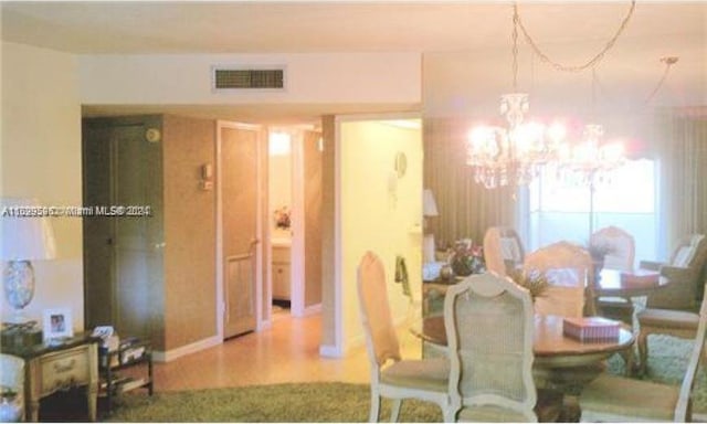 dining room featuring an inviting chandelier