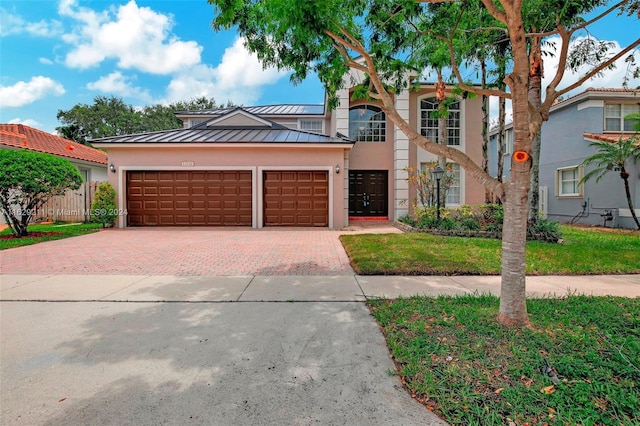 view of front of house with a garage