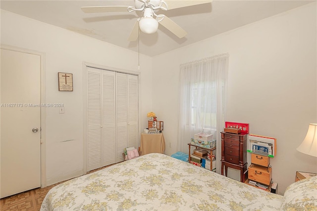 bedroom with a closet and a ceiling fan