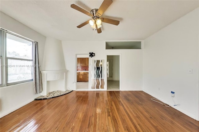 interior space featuring ceiling fan and tile patterned floors