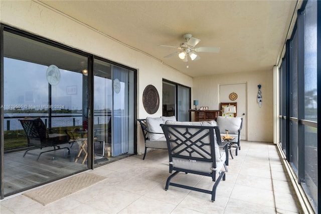 sunroom / solarium with ceiling fan