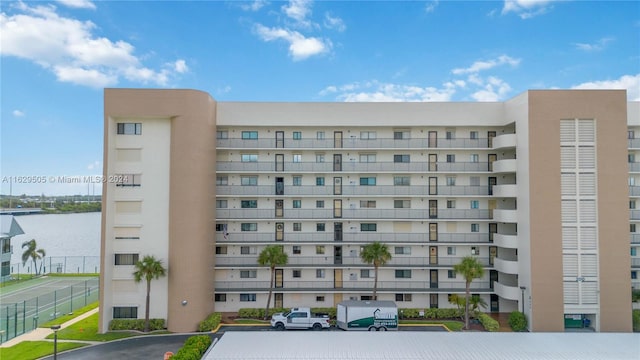 view of building exterior featuring a water view