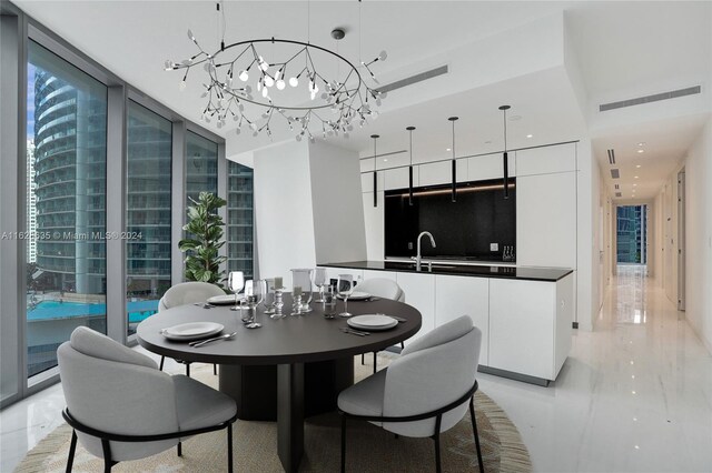 dining area with a wall of windows