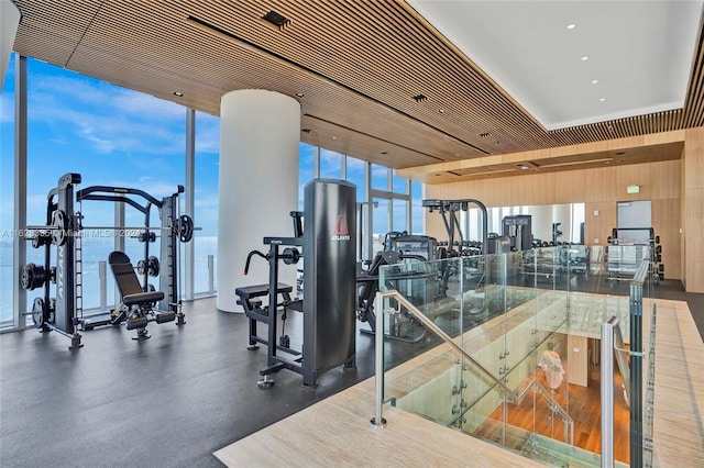 exercise room featuring floor to ceiling windows