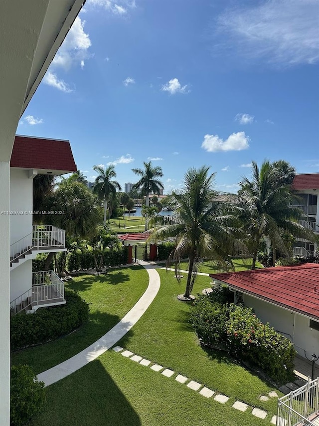 view of community featuring a yard