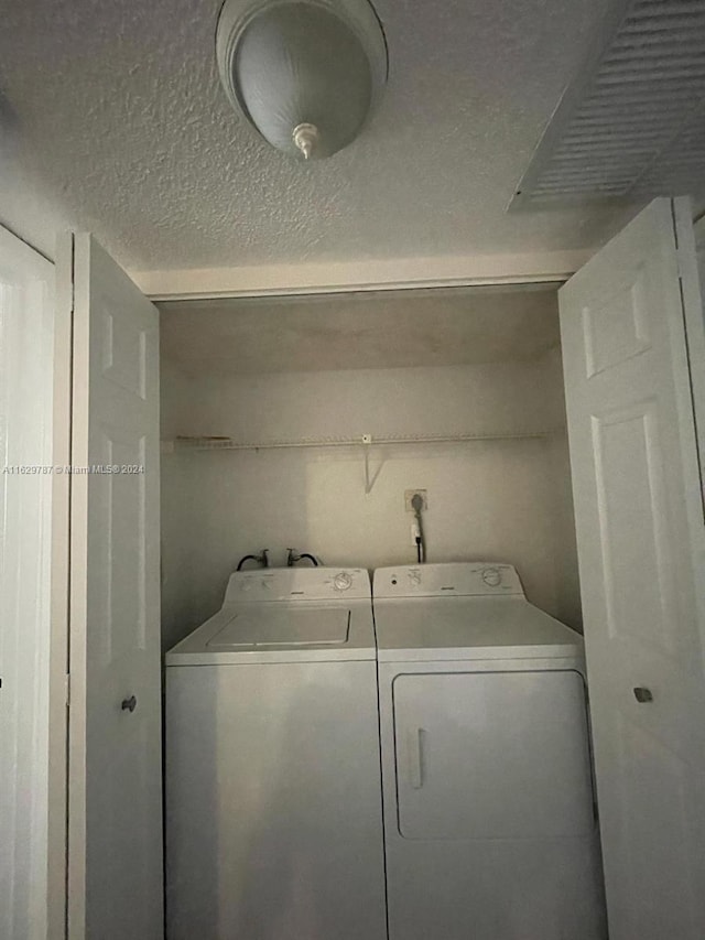 laundry room featuring washer and dryer