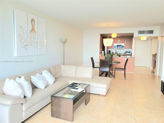 living room featuring light tile patterned floors