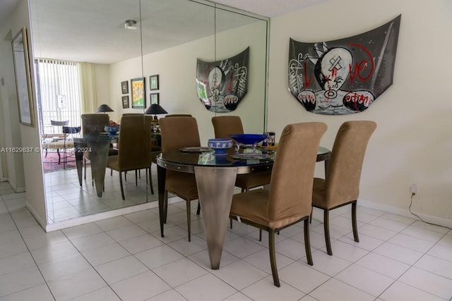 dining room with light tile patterned flooring