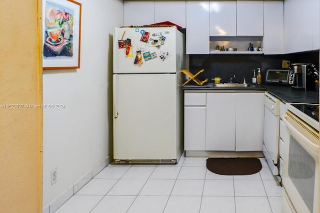 kitchen with white cabinetry, white appliances, sink, and backsplash