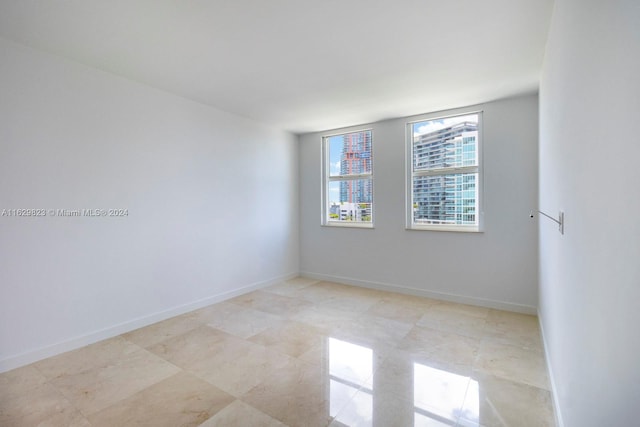 view of tiled empty room