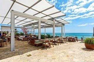 view of patio / terrace with a water view